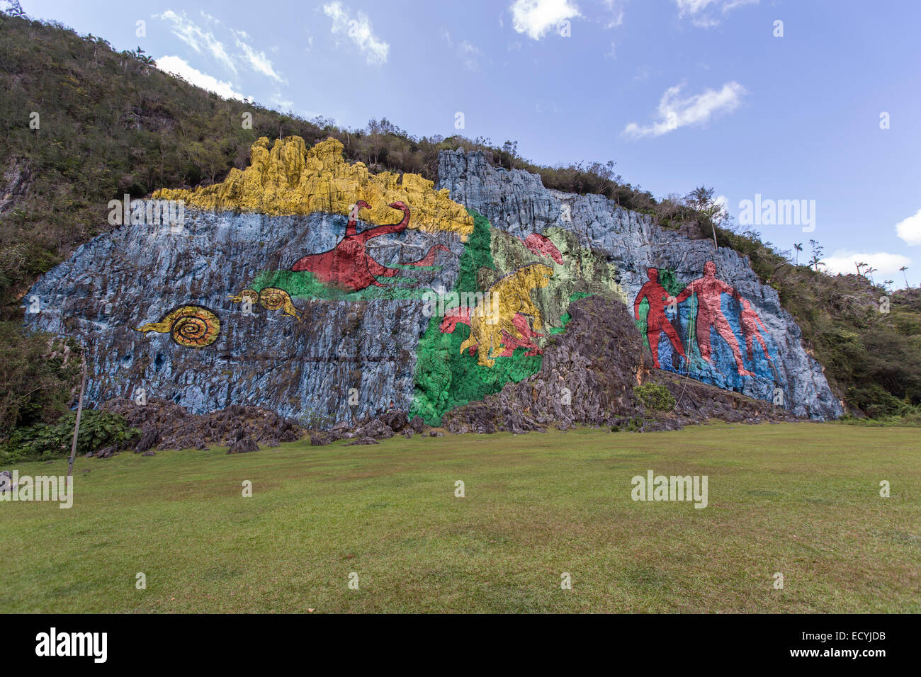 On a cliff at the foot of the 617m-high Sierra de Vinales,Cuba, the Mural de la Prehistoria is a 120m-long painting on the side Stock Photo