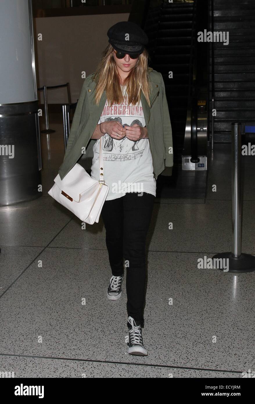 Dakota Johnson at Los Angeles International Airport (LAX)  Featuring: Dakota Johnson Where: Los Angeles, California, United States When: 18 Jun 2014 Stock Photo