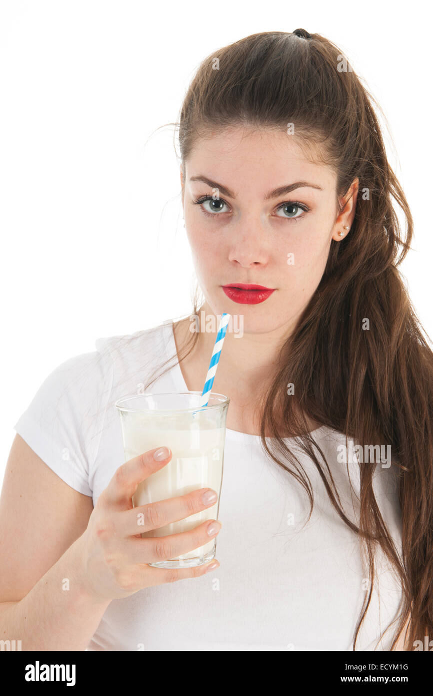 Attractive young woman drinking glass of milk Stock Photo Alamy
