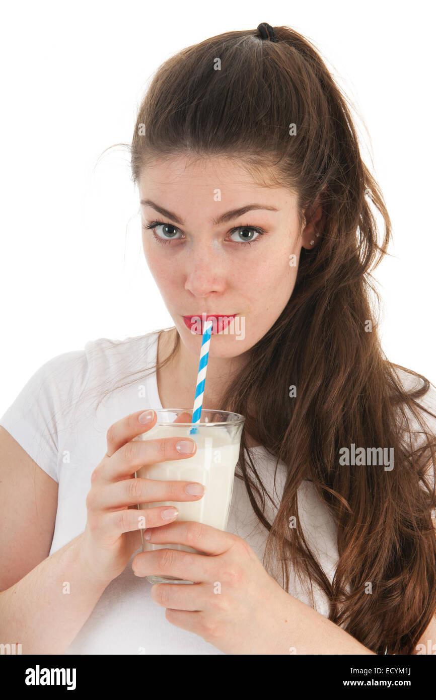 Attractive young woman drinking glass of milk Stock Photo Alamy