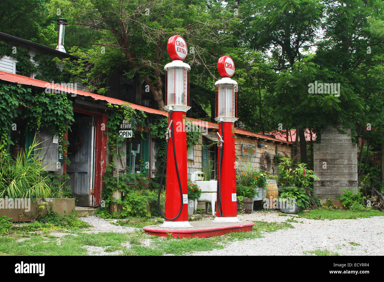 Gasoline Pumps outside the Old Stuff Antique store. Gasoline pumps are identified as Benkin Pumps. Rabbit Hash, Kentucky, USA. C Stock Photo