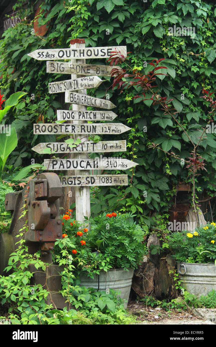 Signpost outside Old Stuff Antique store. .Rabbit Hash, Kentucky, USA. Circa 1813. A historic small town on the Ohio River. Adde Stock Photo