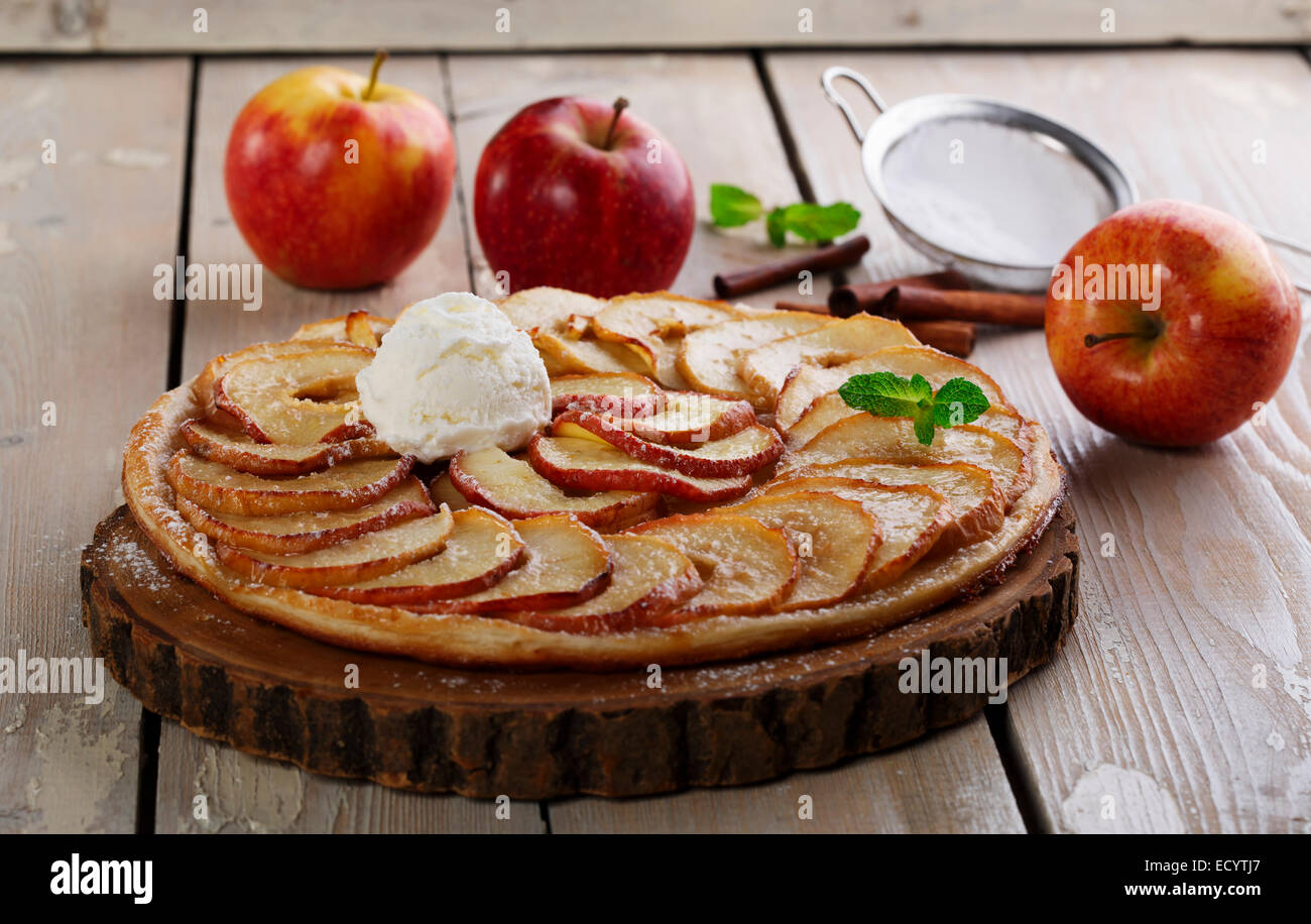 Open apple pie puff pastry with ice cream Stock Photo