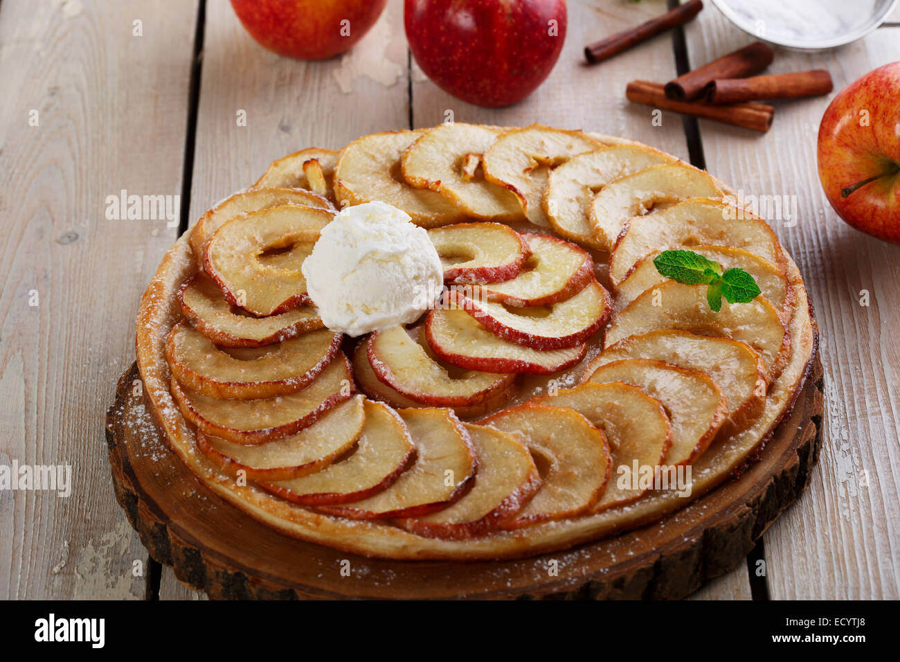 Open apple pie puff pastry with ice cream Stock Photo