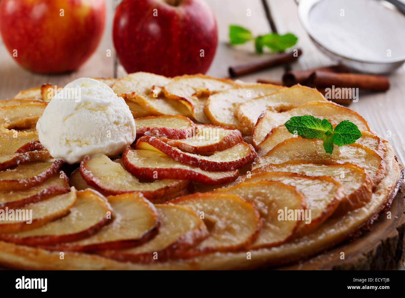 Open apple pie puff pastry with ice cream Stock Photo