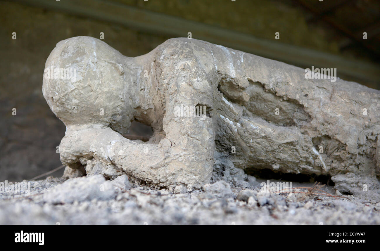 The plaster cast of a human remain at Pompeii, Italy. Stock Photo