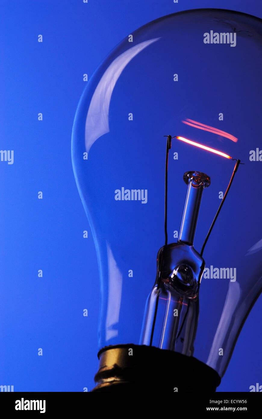 Light bulb on blue background Stock Photo - Alamy