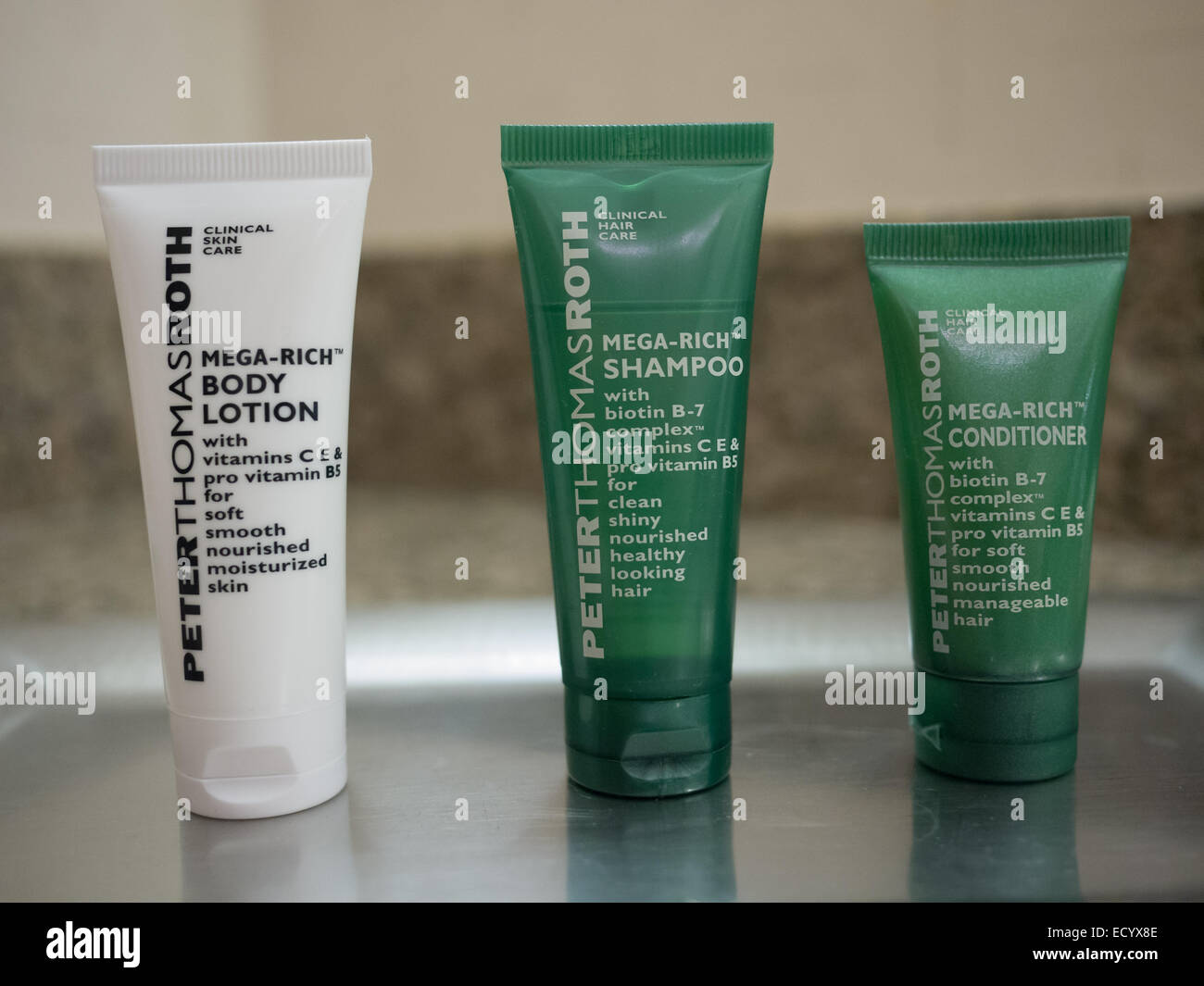 hotel amenity travel size body lotion shampoo conditioner Stock Photo