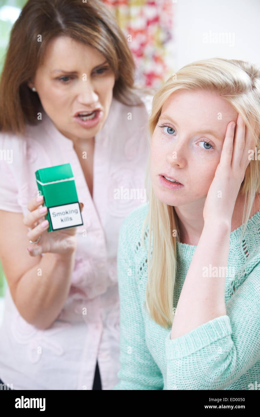 Mother Confronting Daughter Over Dangers Of Smoking Stock Photo