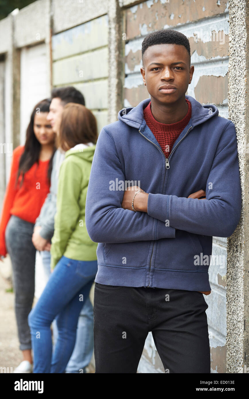 Gang Of Teenagers Hanging Out In Urban Environment Stock Photo - Alamy
