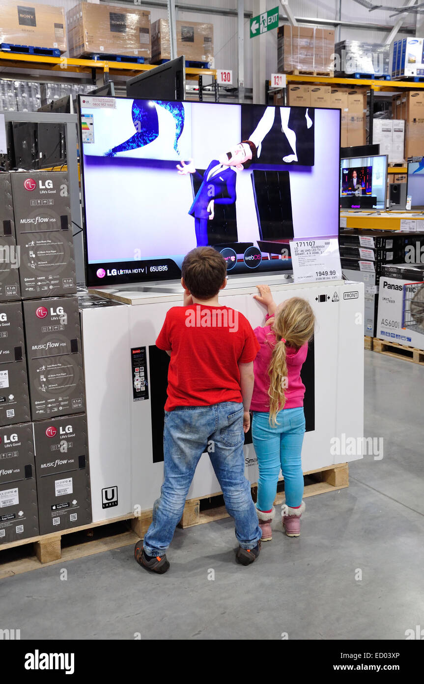 Children watching television in Costco Wholesale Store, Hayes Rd