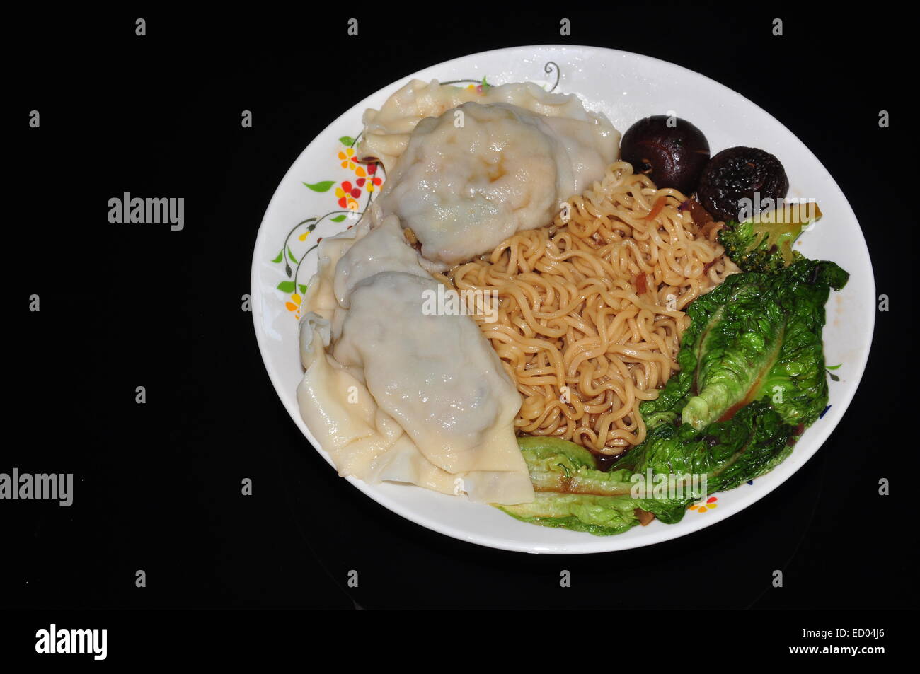 vegetable wonton noodles served with mix vegetables dumplings Stock Photo Alamy