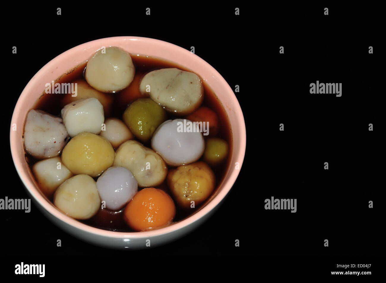 colorful glutinous rice ball in ginger black sugar syrup Stock Photo