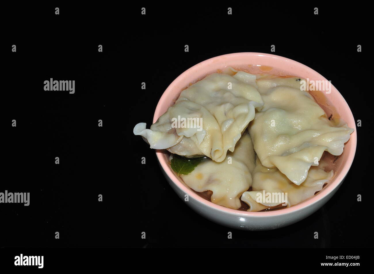 chinese mix vegetables dumplings served in celery soup Stock Photo Alamy
