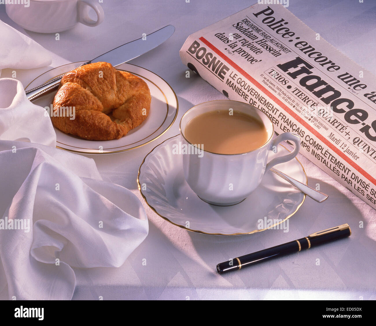 French continental breakfast with tea and croissant, Paris, Îlede