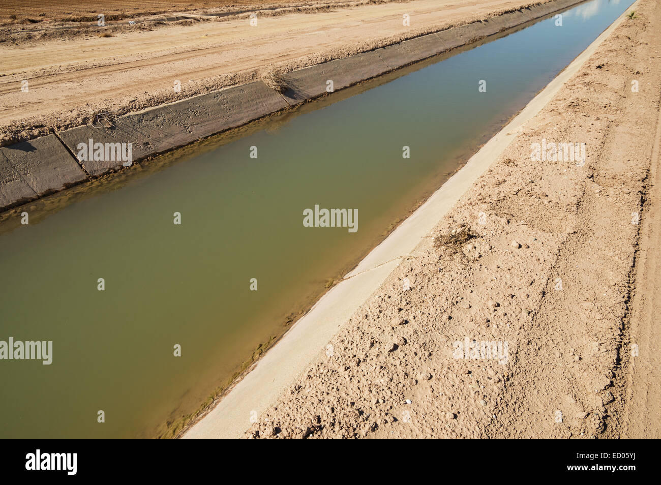 Imperial Valley irrigation canal with concrete lining Stock Photo