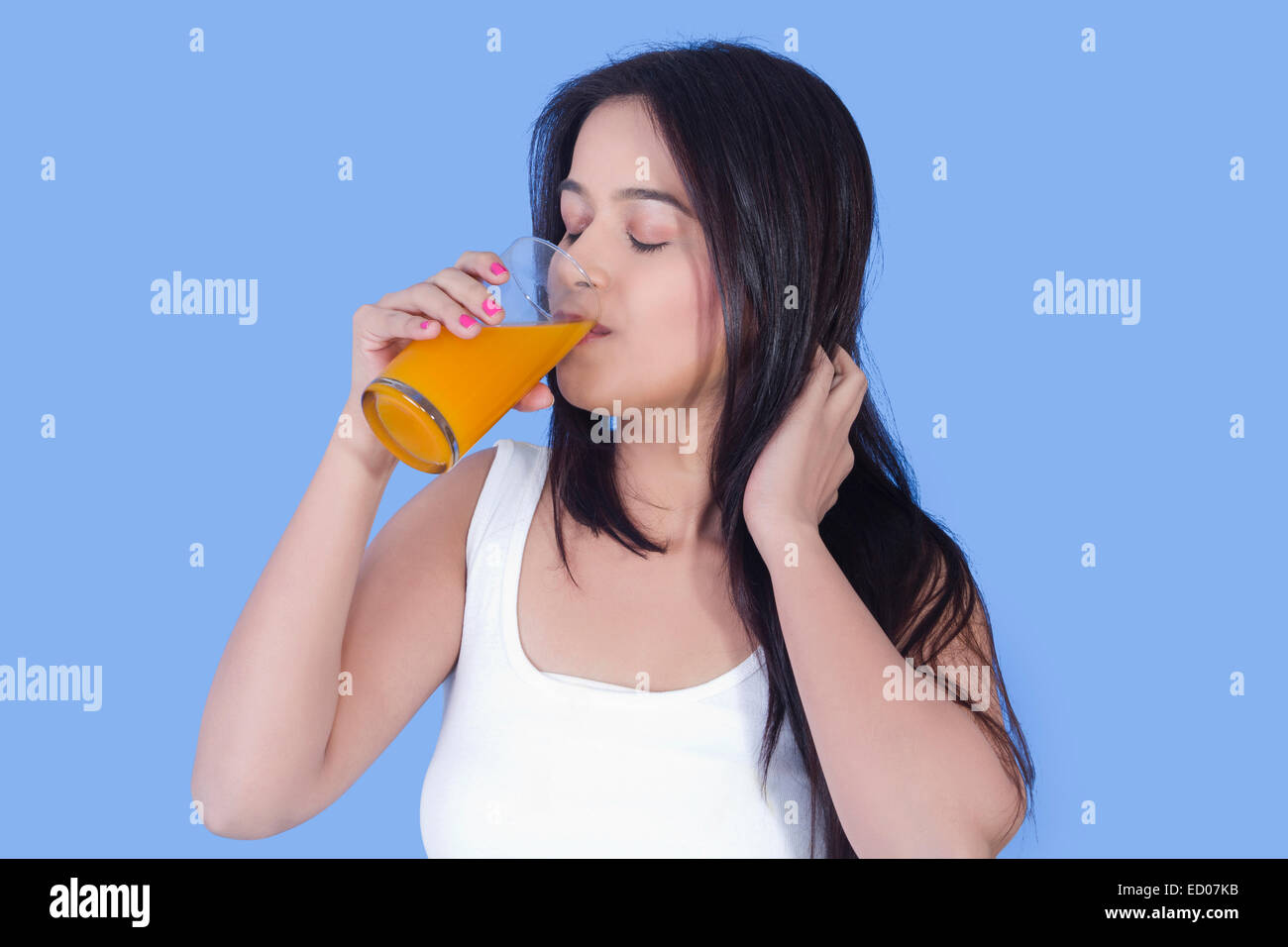 1 indian Beautiful Lady Drinking Fruit Juice Stock Photo - Alamy