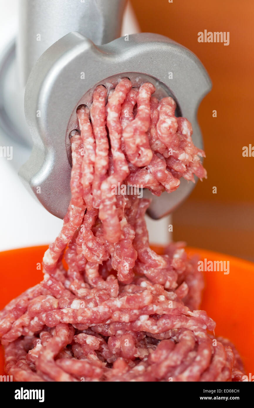 Mincer and a pile of chopped meat Stock Photo