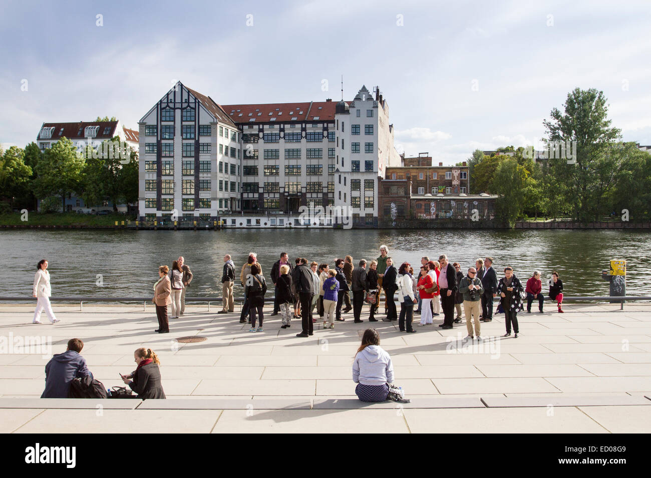 Tourists near Spree river in Berlin, Germany. Stock Photo