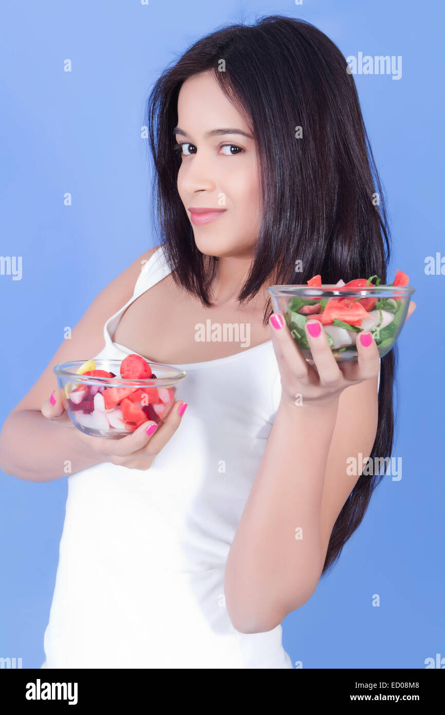 1 indian Beautiful lady eating  Salad Dieting Stock Photo