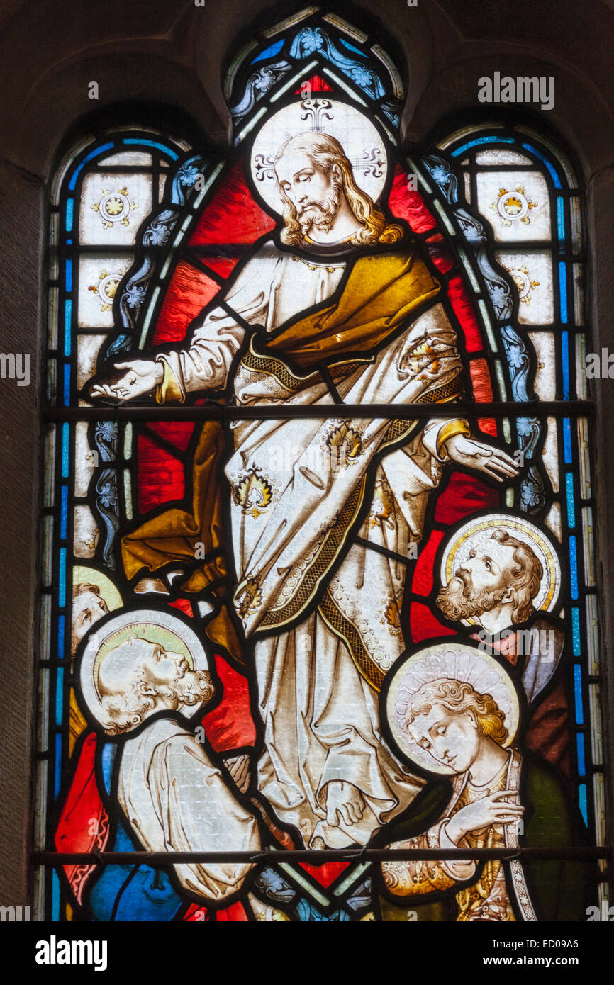 England, Yorkshire, Howarth, St.Michael and All Angels Church, Stained Glass Window depicting Biblical Scene Stock Photo