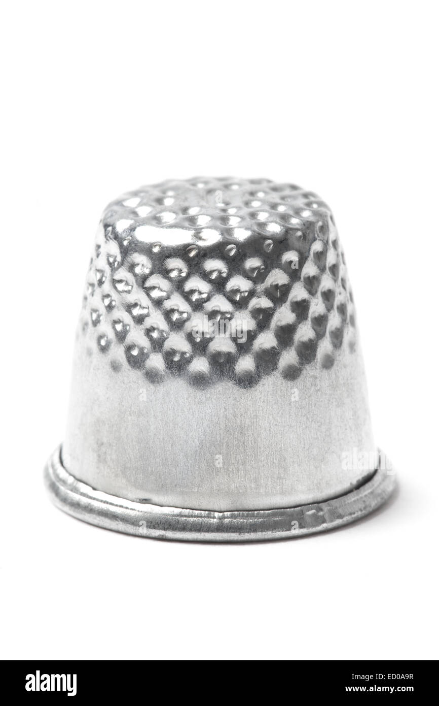Metal sewing thimble, isolated on white background. Stock Photo