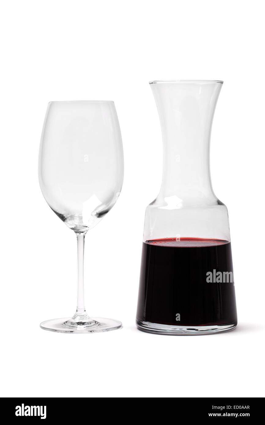 Carafe with red wine and empty glass isolated on white Stock Photo