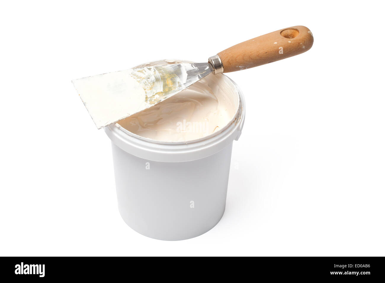 Spatula and bucket with plastering material isolated on white background Stock Photo