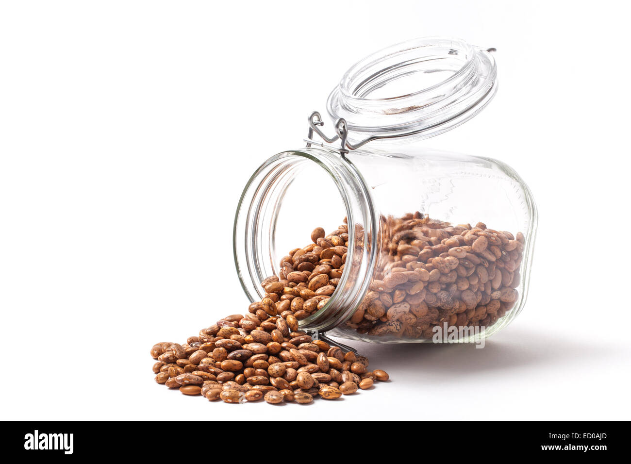 Image of pinto beans in an open jar isolated on white. Stock Photo
