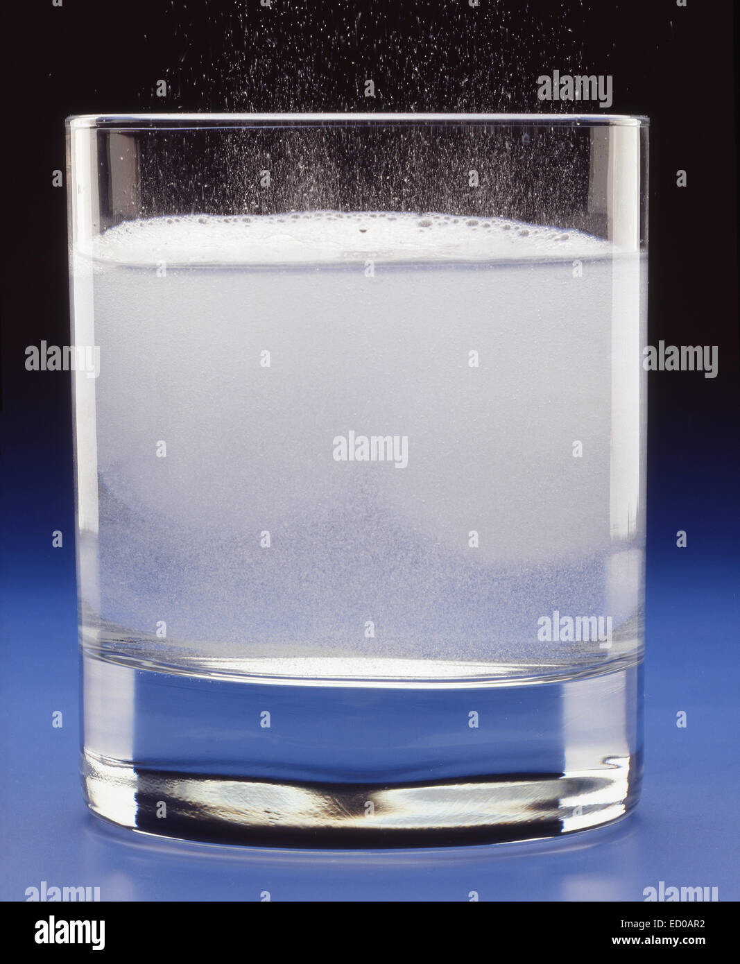 Soluable tablets dissolving in a glass of water Stock Photo