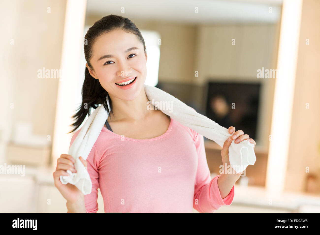 Portrait of young woman with towel Stock Photo - Alamy