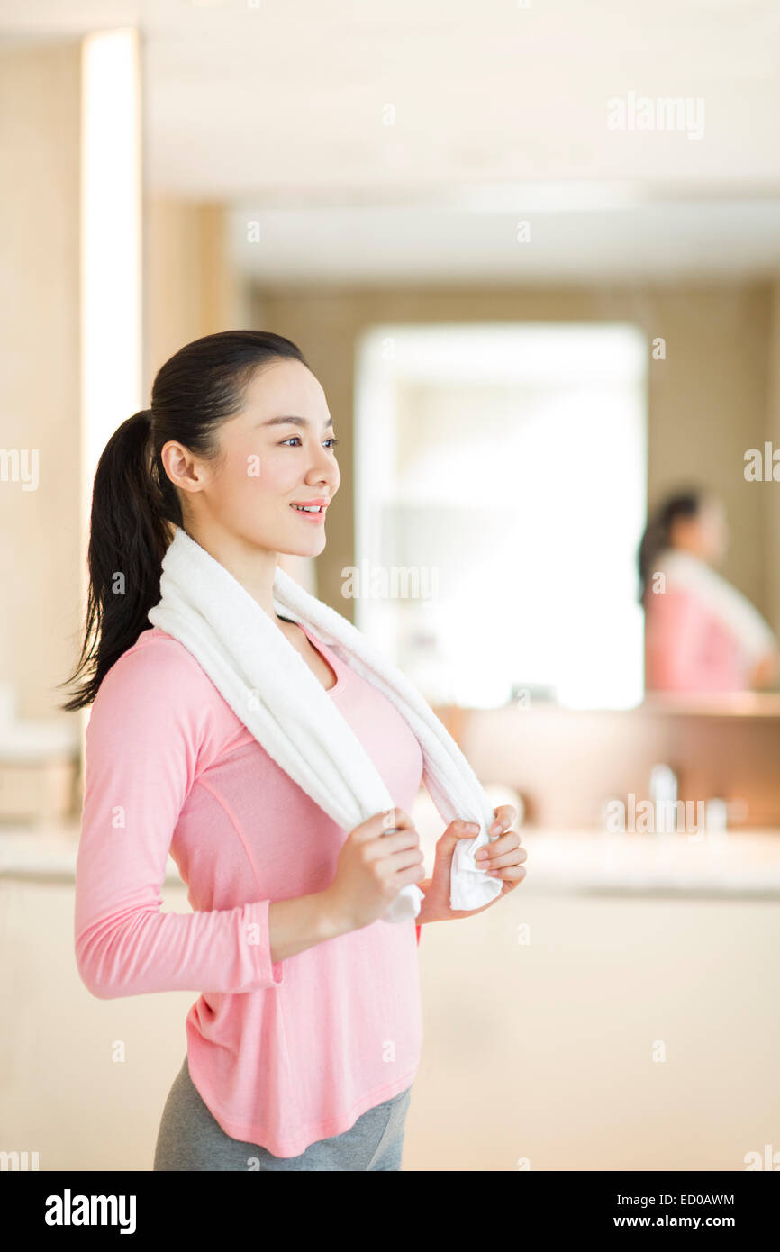 Young woman with towel Stock Photo - Alamy