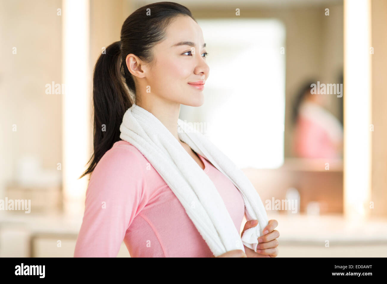 Young woman with towel Stock Photo - Alamy