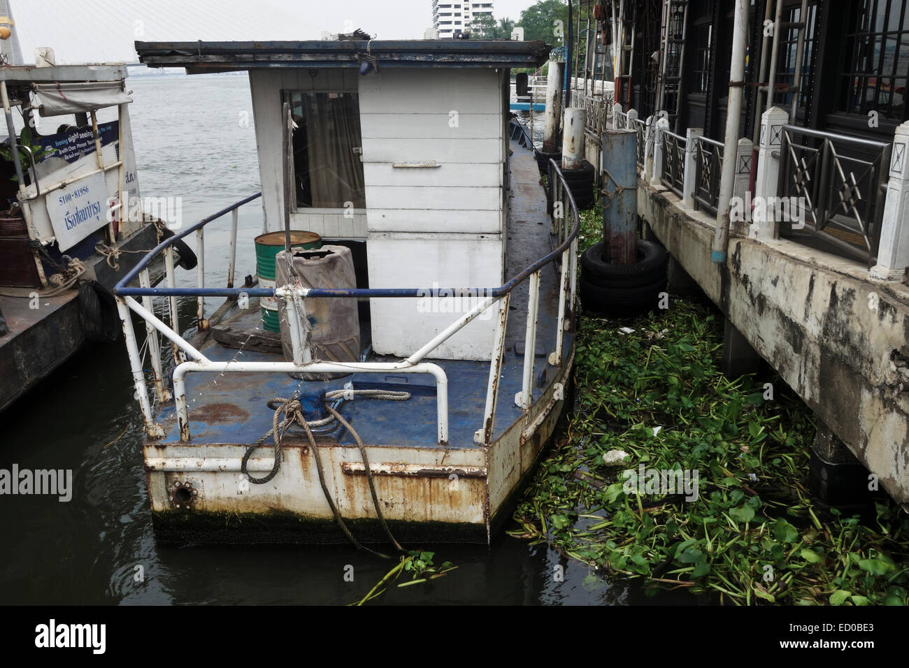 Old Boat on Chao Phraya River, Bangkok, Thailand, Southeast Asia. Stock Photo