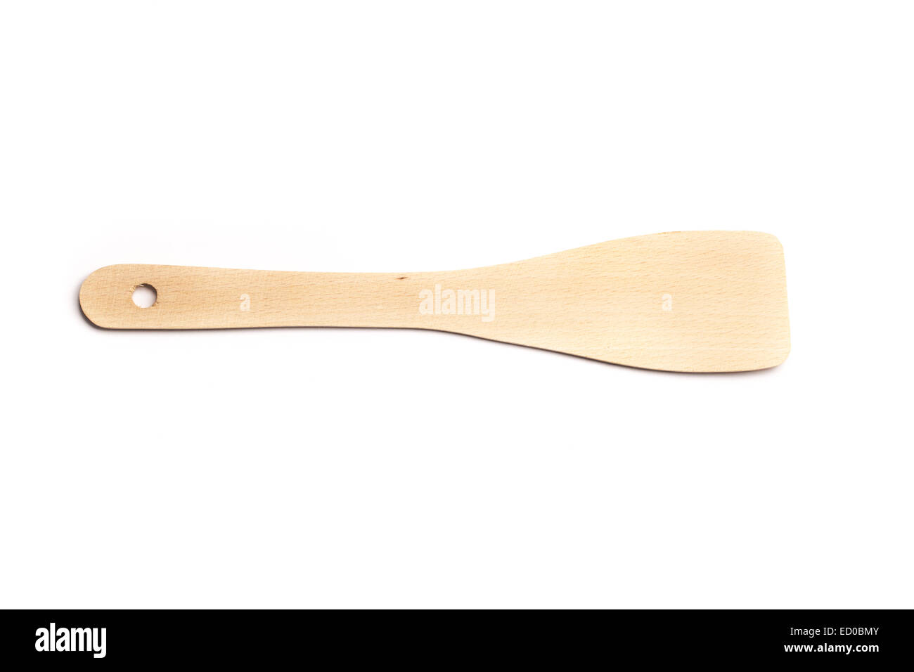 Photo of  a new wooden spatula isolated on white. Stock Photo