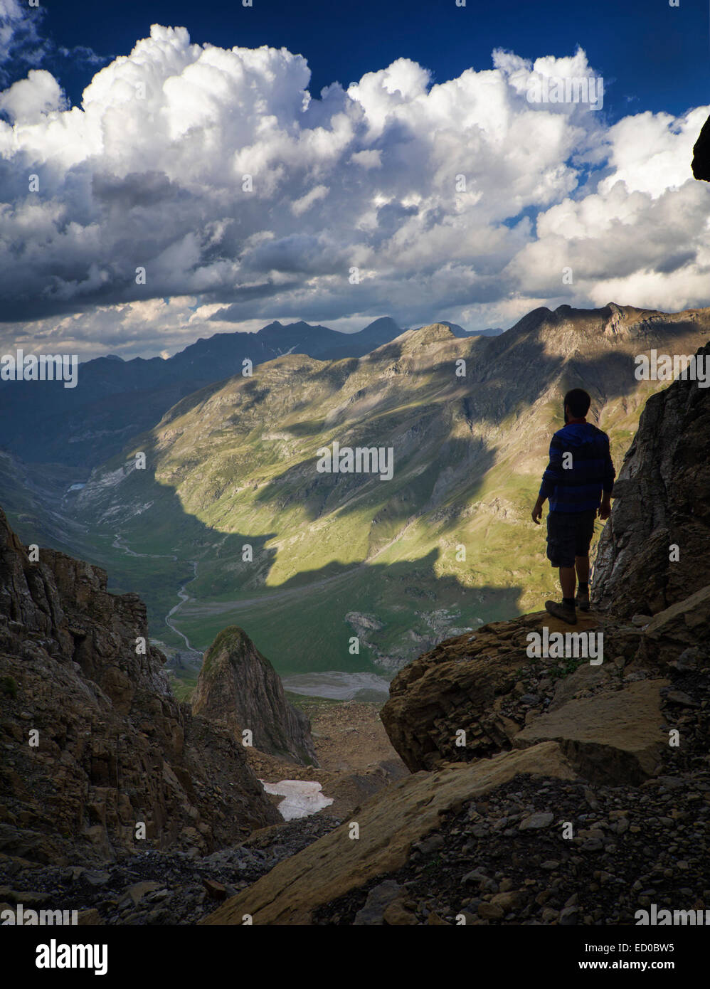 Spain, Aragan, Provincia de Huesca, Bielsa, Landscape with man looking at view in Pyrenees Stock Photo