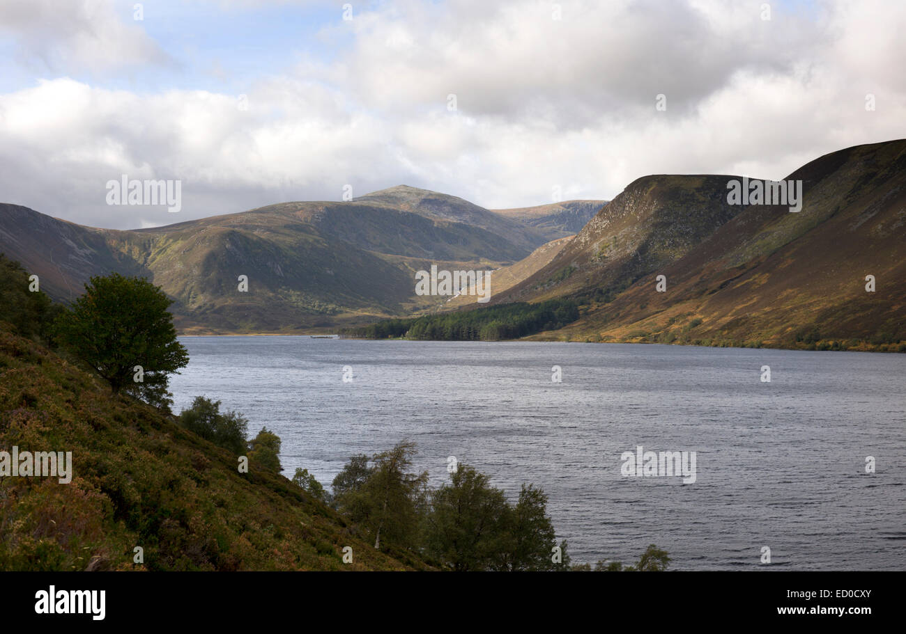 Looking across Loch Muick to Queen Victorias Glas allt Shiel and the surrounding mountains and hills Stock Photo