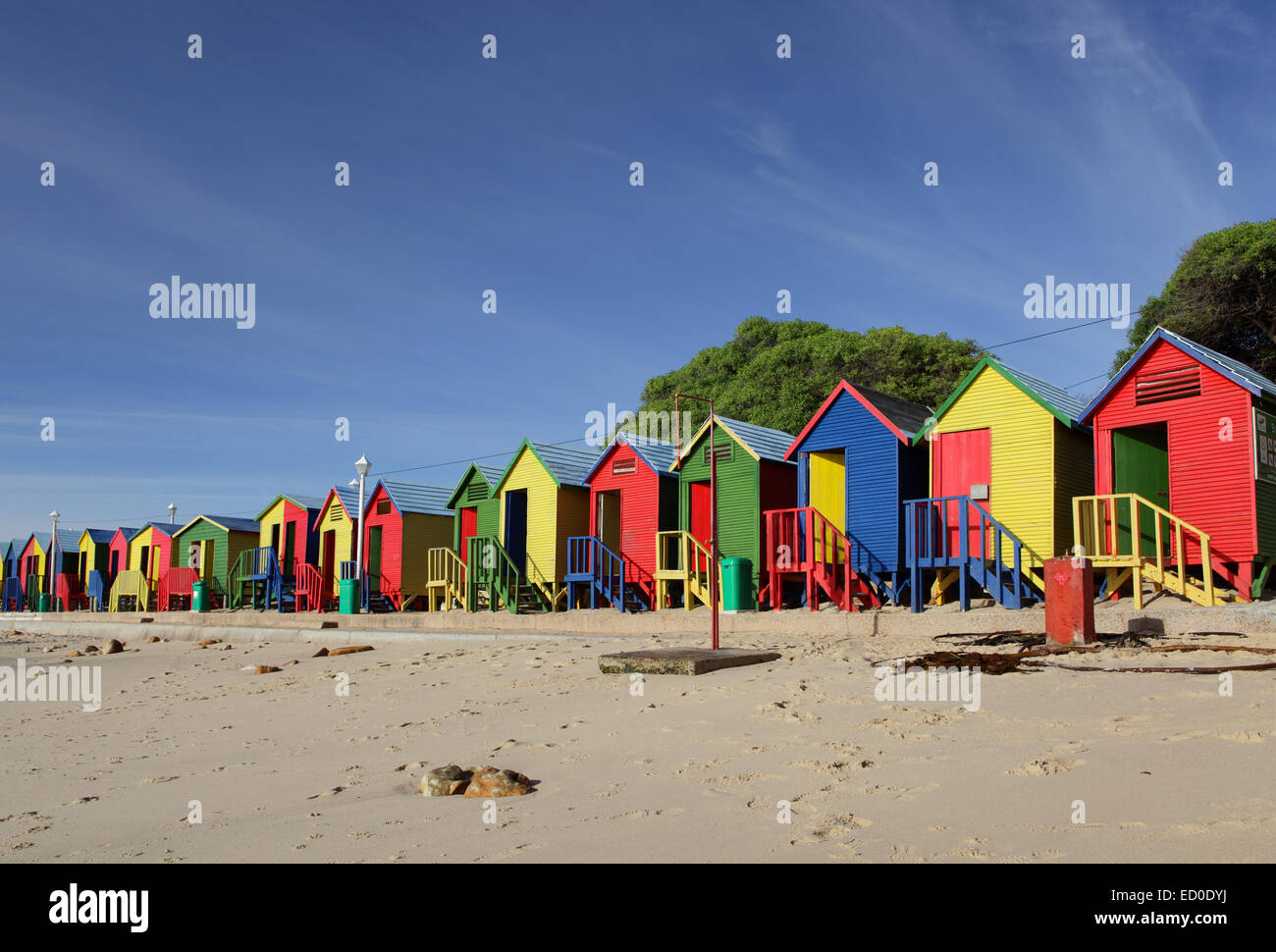 South Africa, Cape Town, St Jame's Beach, Muizenberg, Row of multi colored beach houses Stock Photo