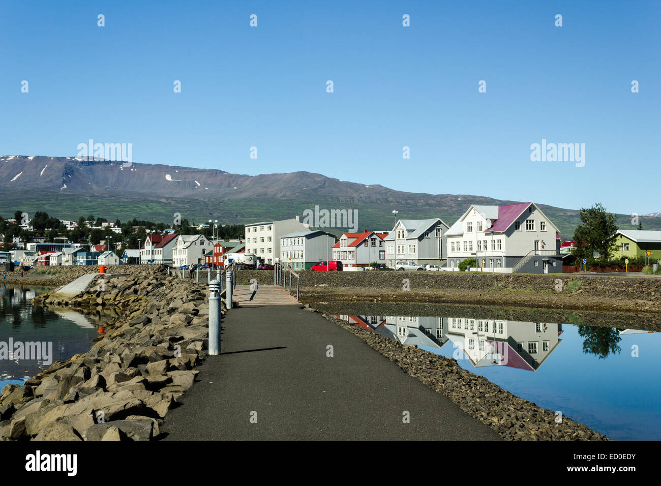 Iceland, Akureyri, View of village in mountains Stock Photo