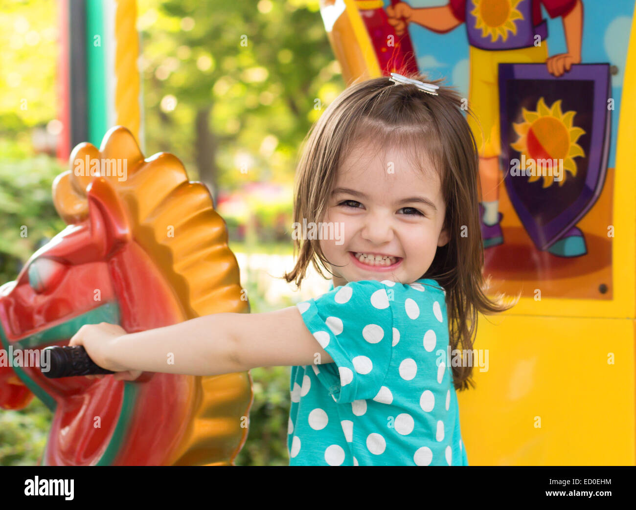 Little girl having fun in park Stock Photo