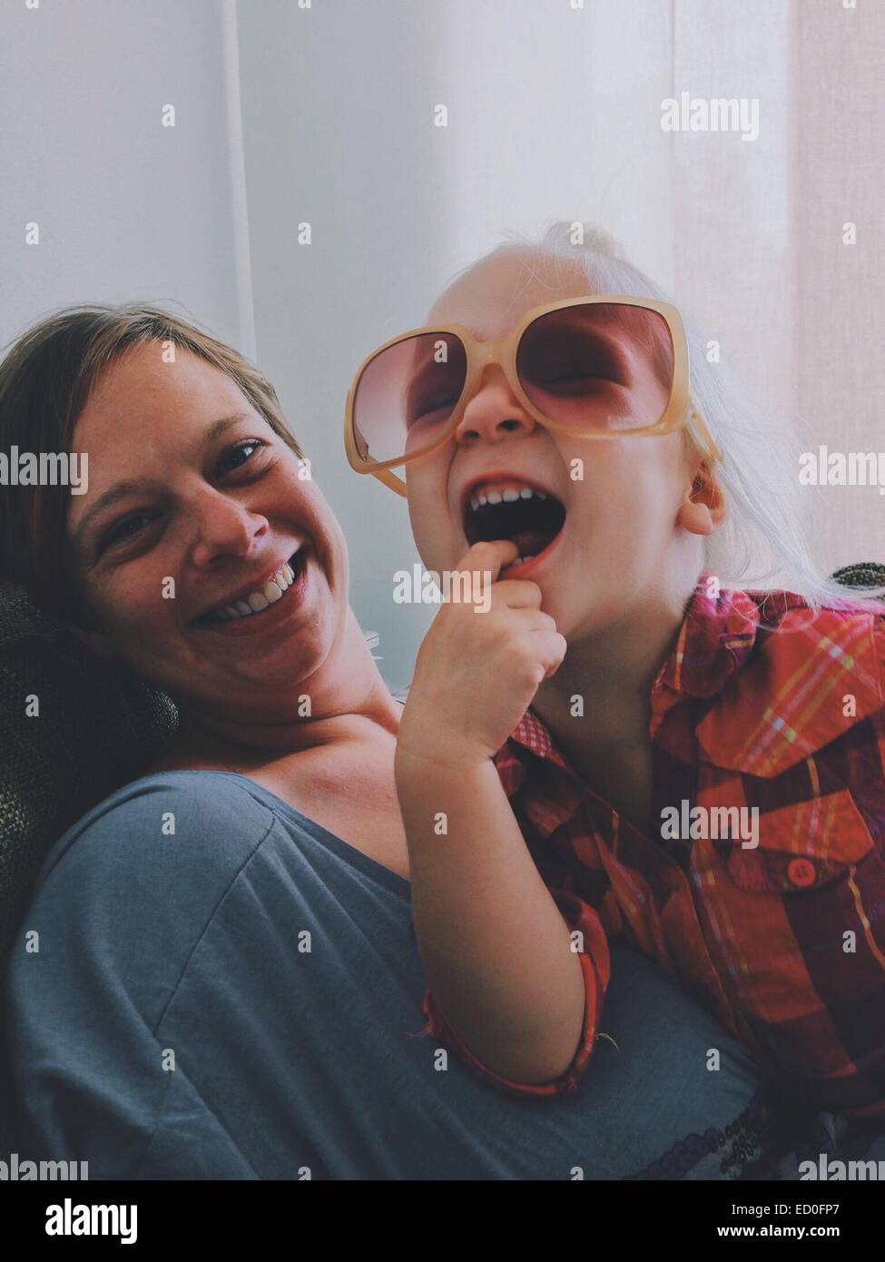 Mother and daughter messing about Stock Photo