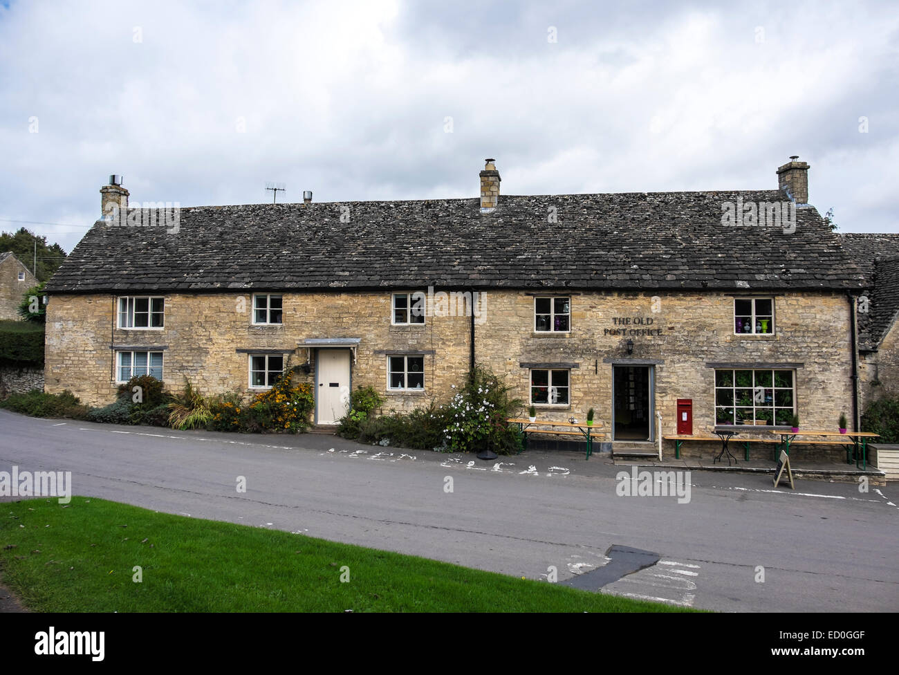The Old Post office and Cotswold stone cottages The Square Guiting Power The Cotswolds Gloucestershire England Stock Photo