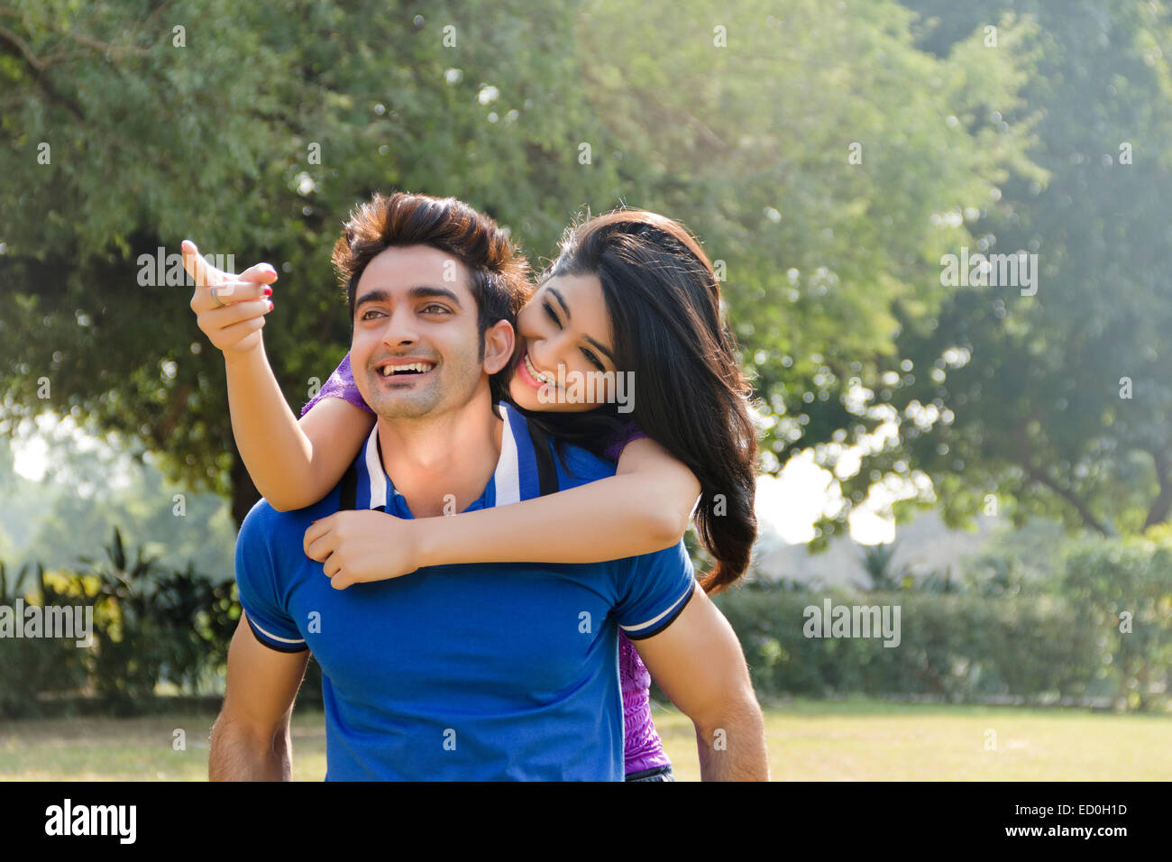 2 indian couple park enjoy Stock Photo - Alamy