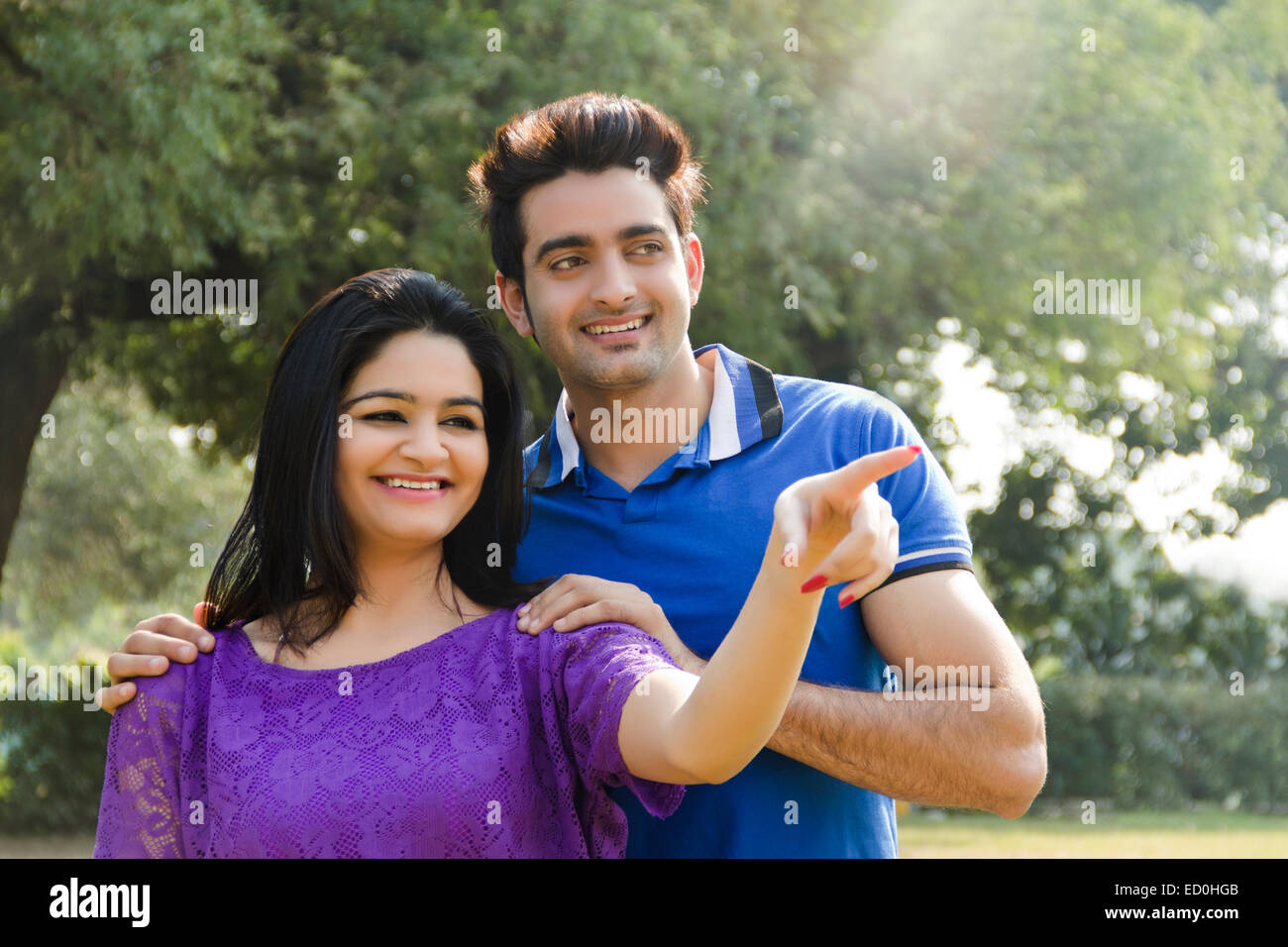 2 indian couple park enjoy Stock Photo - Alamy