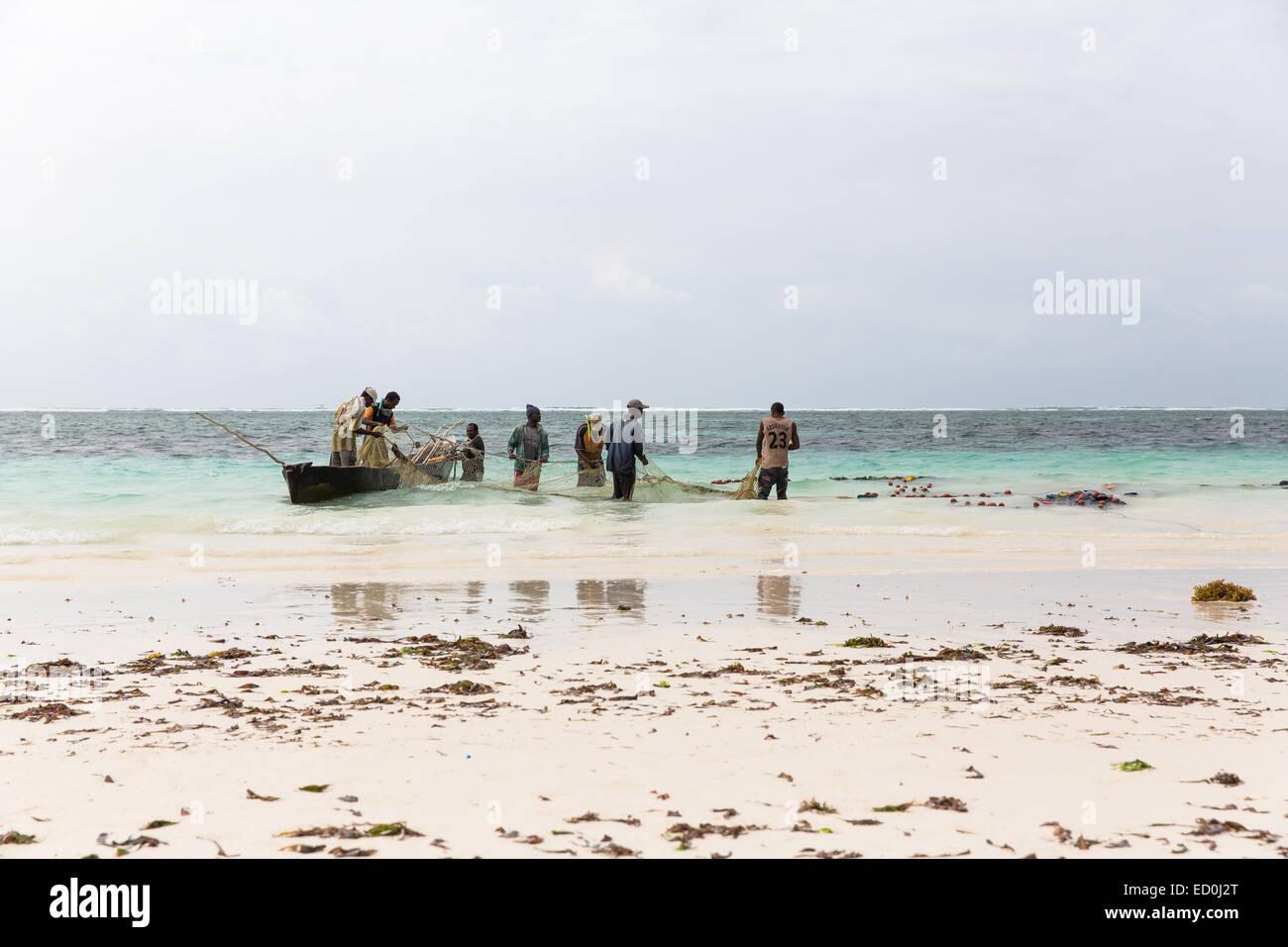 Fisherman sand Diani beach holiday white sea Kenya Indian ocean Stock Photo