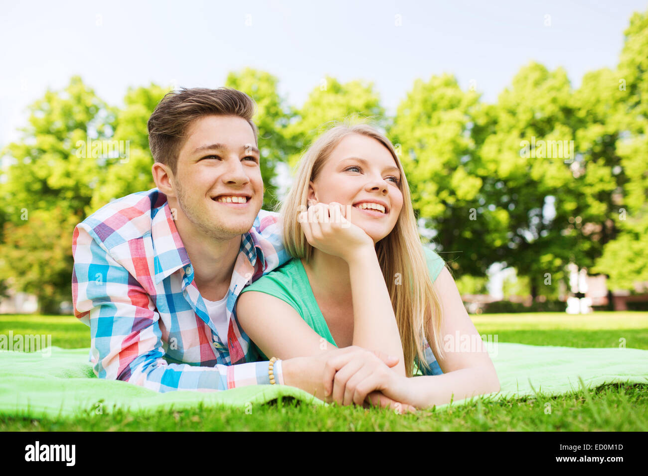 smiling couple in park Stock Photo - Alamy