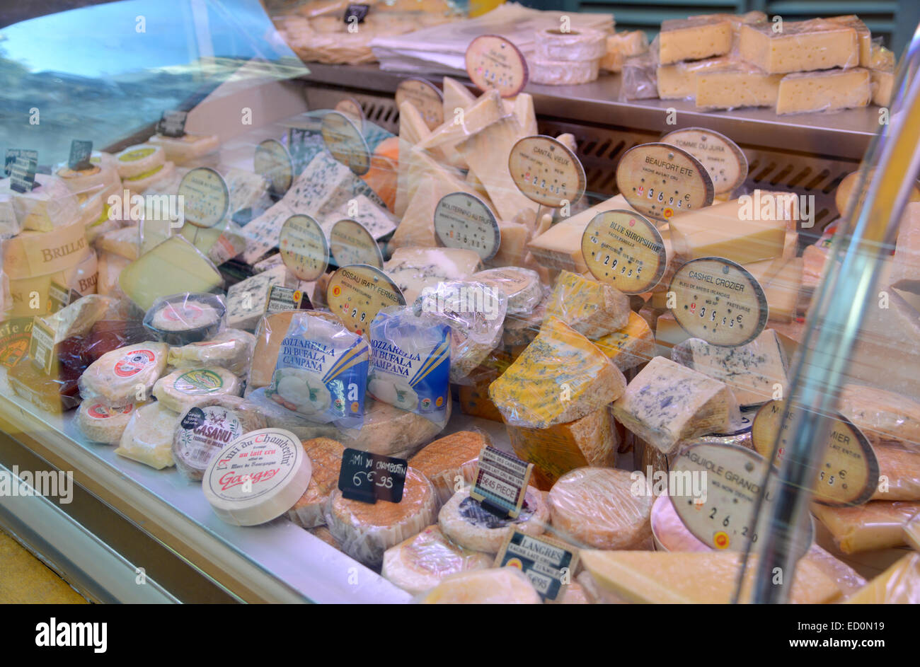 Cheeses for sale at a Paris grocer Stock Photo Alamy