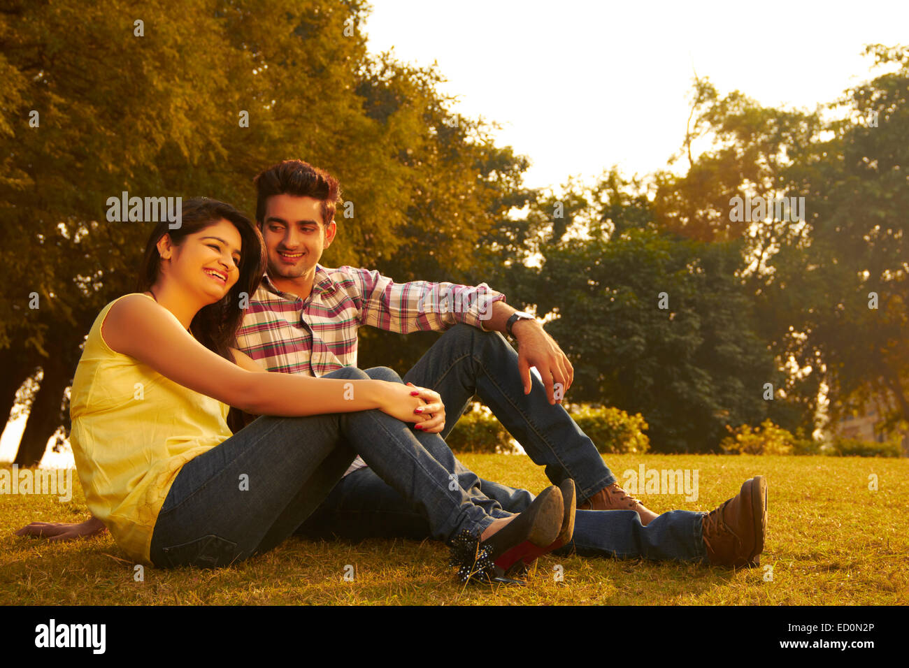 2 indian couple park enjoy Stock Photo - Alamy