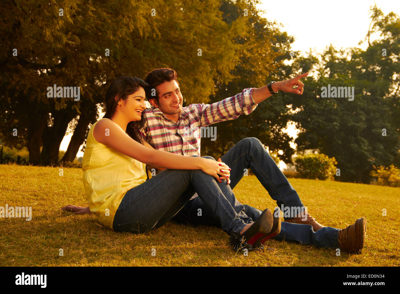 2 indian couple park enjoy Stock Photo - Alamy