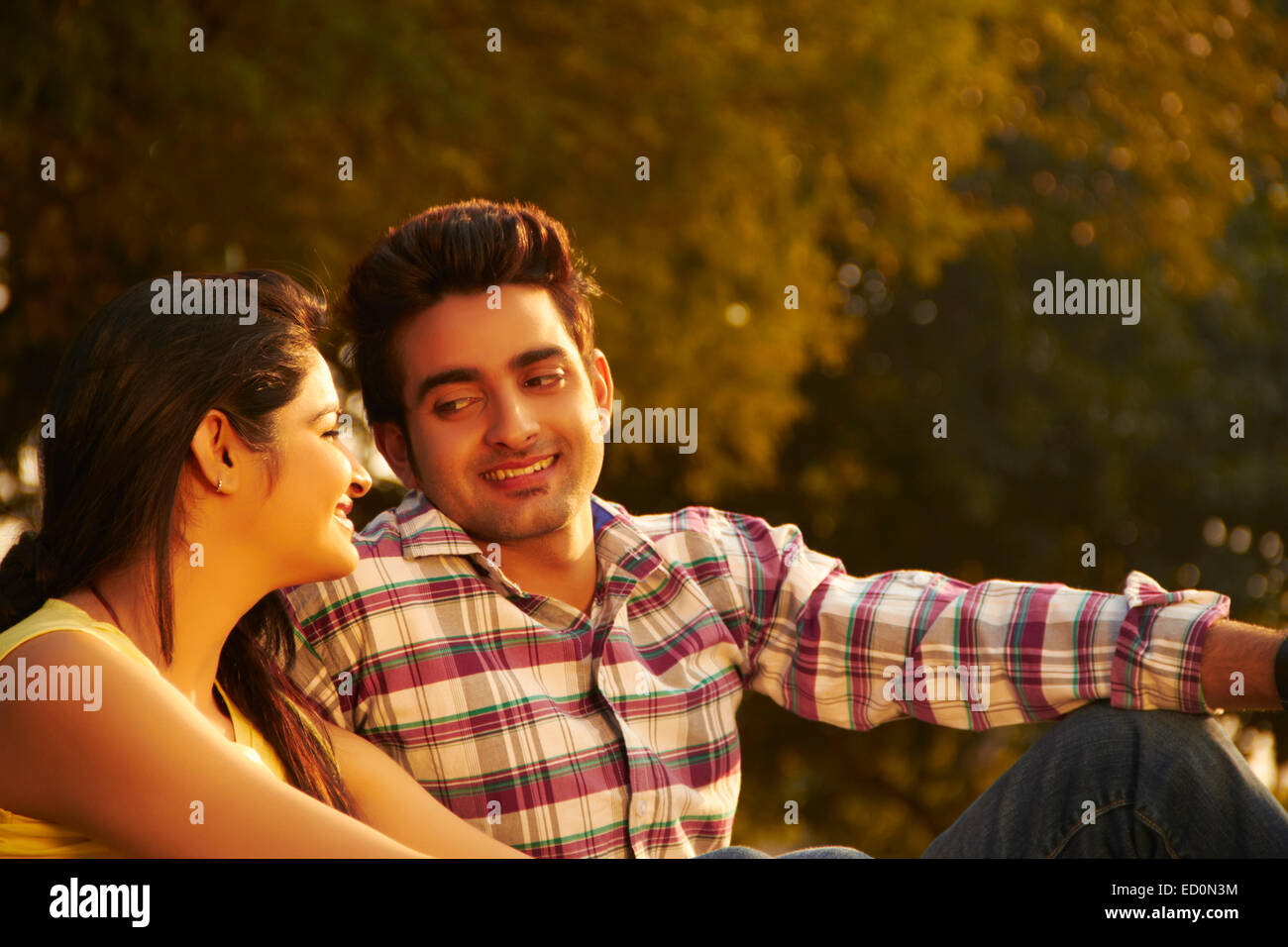2 indian couple park enjoy Stock Photo - Alamy
